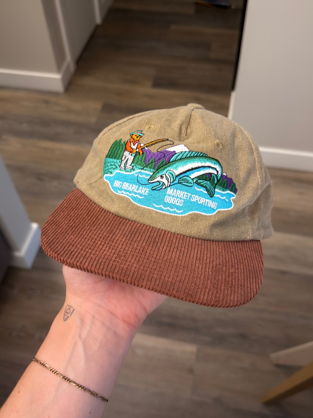 Hat with adjustable strap